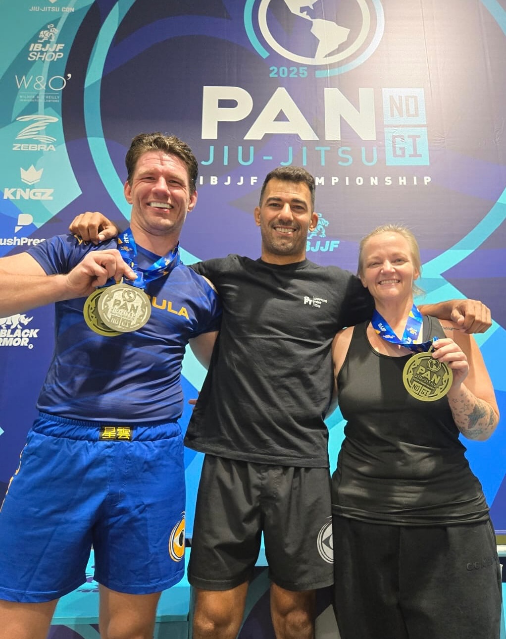 Deivid with two Pan No-Gi medalists at the IBJJF Pan Jiu-Jitsu Championship 2025