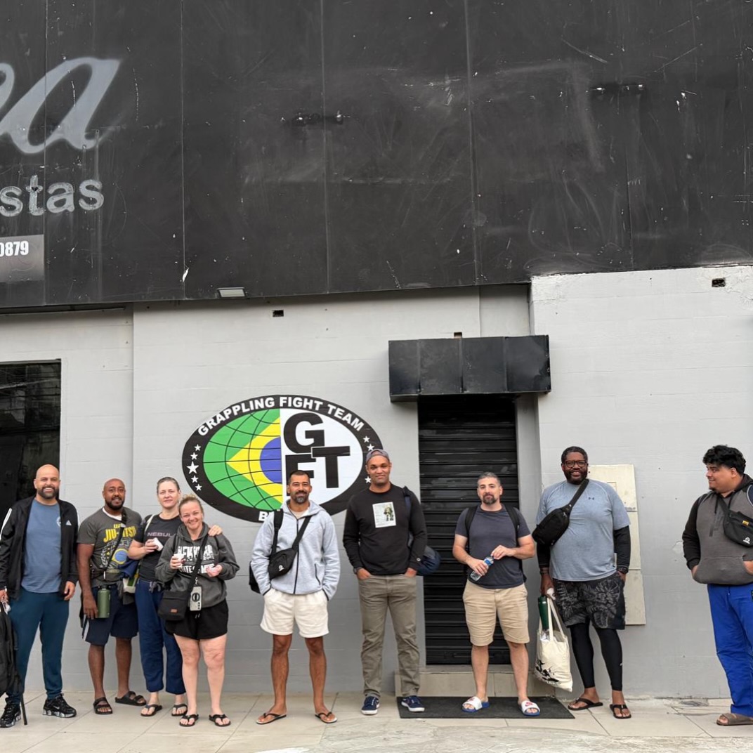 OSS Rio Tour 2026 group with Deivid in front of GFTeam
